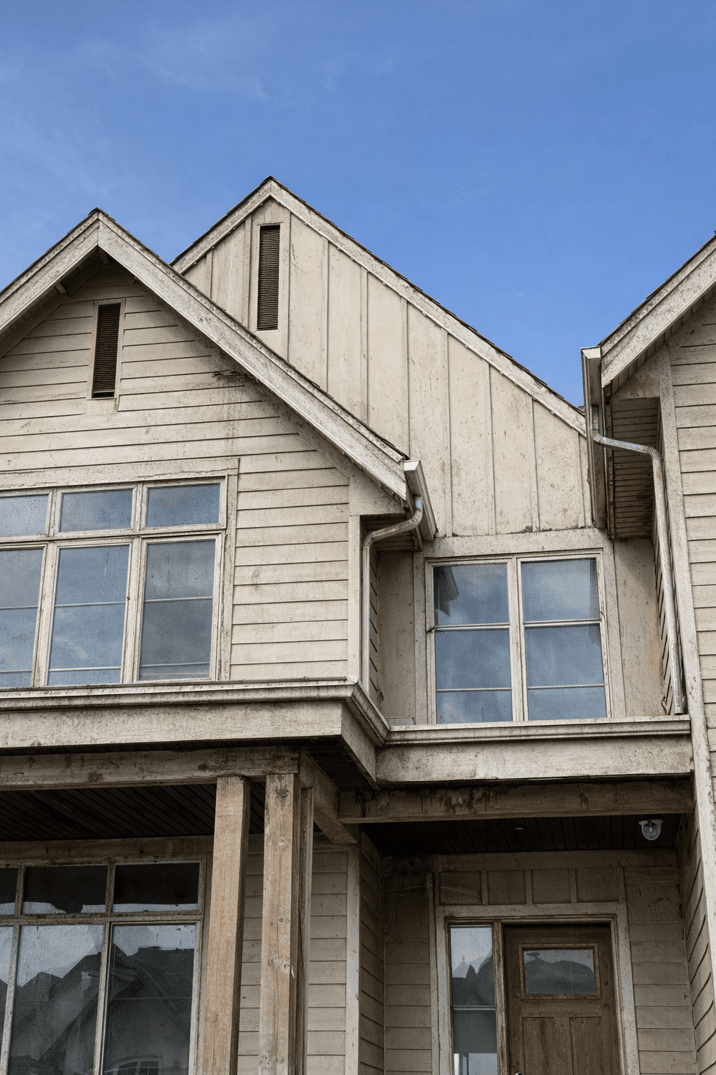 Before: Full Siding Replacement