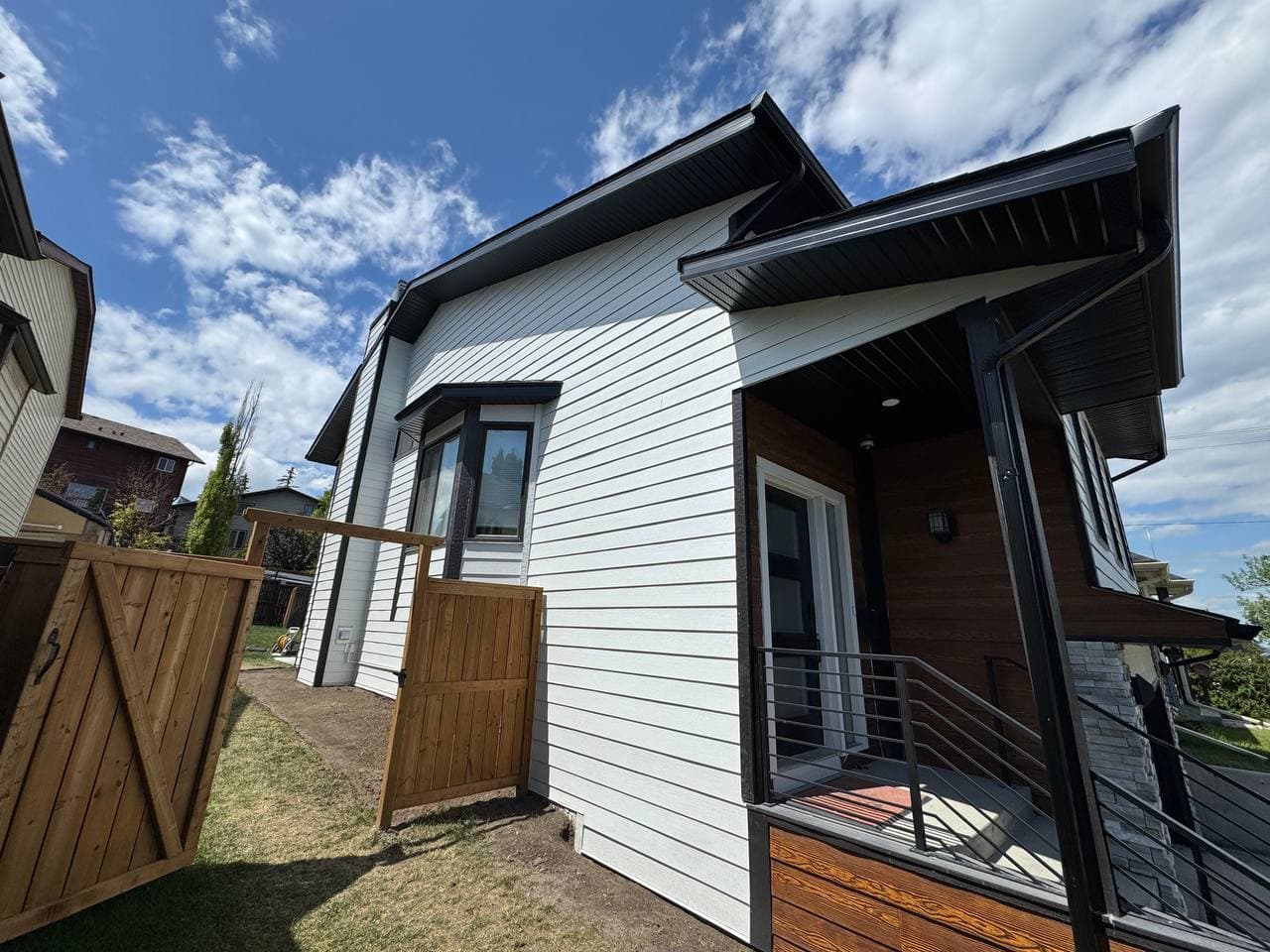 Full exterior renovation replacing outdated vinyl siding with durable Hardie board. The upgrade enhances curb appeal while significantly improving protection and long-term performance.