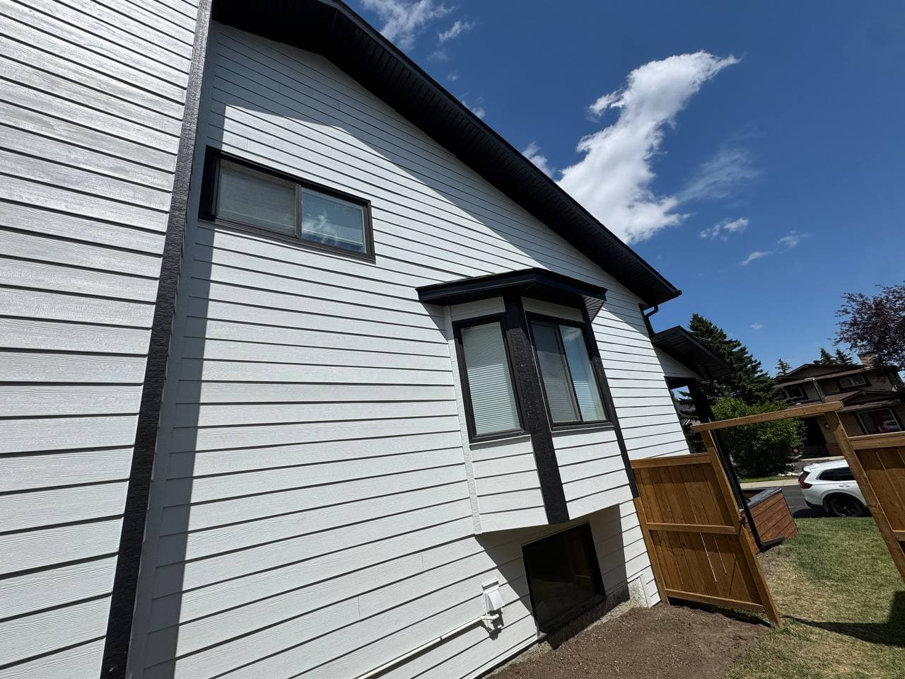 Full exterior renovation replacing outdated vinyl siding with durable Hardie board. The upgrade enhances curb appeal while significantly improving protection and long-term performance.