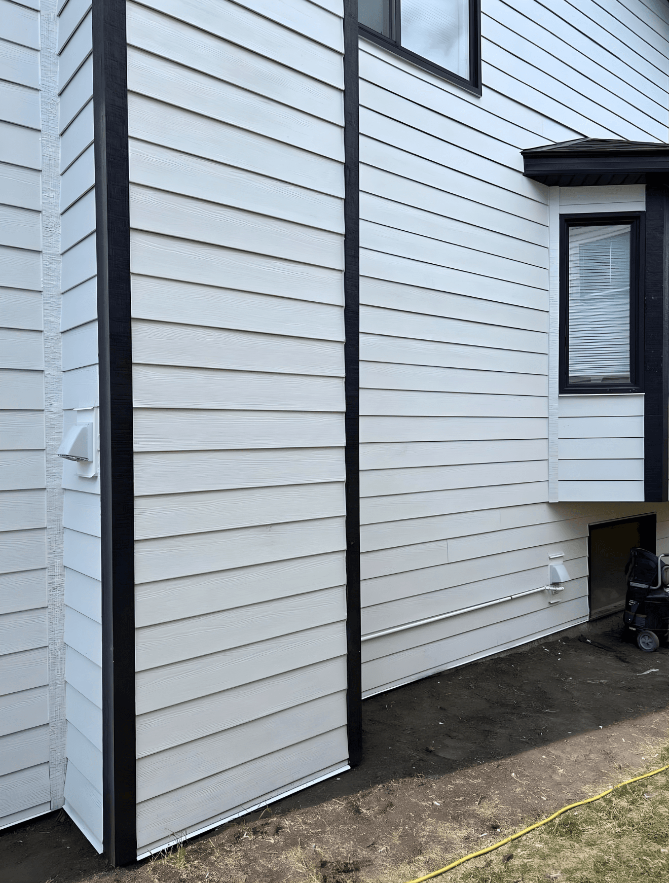 Full exterior renovation replacing outdated vinyl siding with durable Hardie board. The upgrade enhances curb appeal while significantly improving protection and long-term performance.